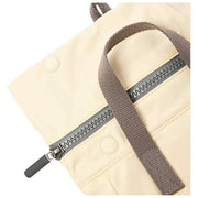 roka-canfield-b-small-recycled-nylon-backpack---wax-paper-stripe-cream-35903216